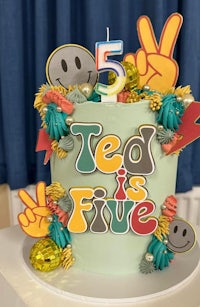 a cake with the words ted is five on it